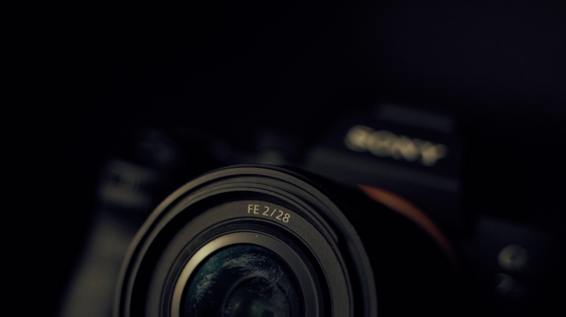 Modern photo camera lens in studio